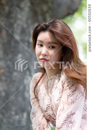 The look of a beautiful Korean woman, a park walk The look of a beautiful Korean woman, a park walk 60502639