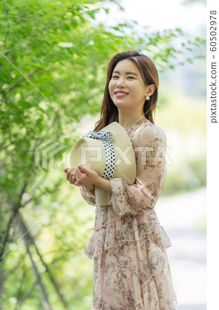The look of a beautiful Korean woman, a park walk The look of a beautiful Korean woman, a park walk 60502978