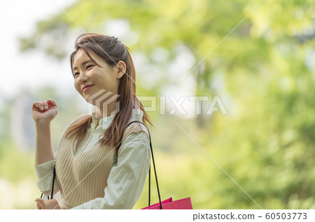 The look of a beautiful Korean woman, a park walk The look of a beautiful Korean woman, a park walk 60503773