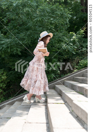 The look of a beautiful Korean woman, a park walk The look of a beautiful Korean woman, a park walk 60504515