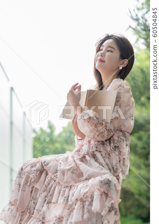 The look of a beautiful Korean woman, a park walk The look of a beautiful Korean woman, a park walk 60504845