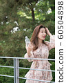 The look of a beautiful Korean woman, a park walk 60504898