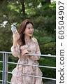 The look of a beautiful Korean woman, a park walk 60504907