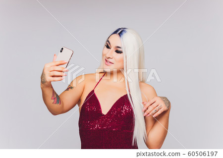 man gay with make up on face. 60506197