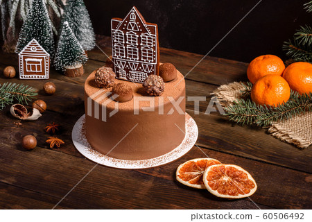 Christmas holiday table with delicious truffle cake Christmas holiday table with delicious truffle cake 60506492