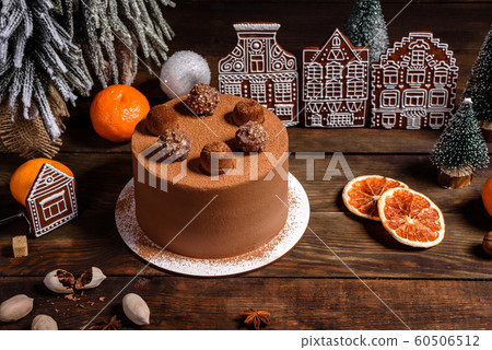 Christmas holiday table with delicious truffle cake Christmas holiday table with delicious truffle cake 60506512
