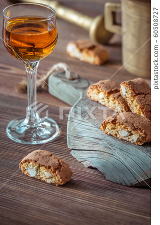 Cantuccini with a glass of Italian dessert wine 60508727
