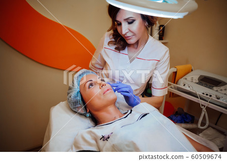 Cosmetology procedures on the face in clinic Cosmetology procedures on the face in clinic 60509674