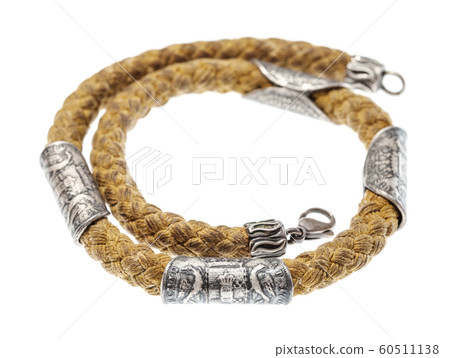 cotton necklace with ancient silver coins isolated 60511138