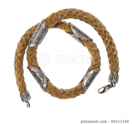 coiled necklace with ancient silver coins isolated coiled necklace with ancient silver coins isolated 60511140