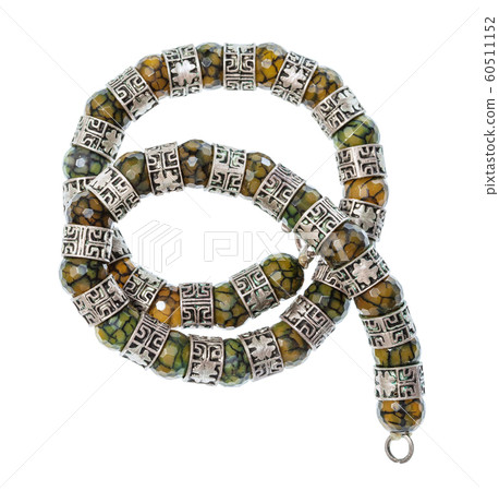 coiled necklace from faceted Jadeite gems isolated 60511152