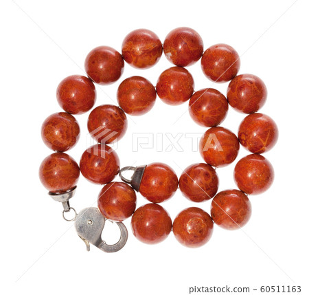 spiral necklace from polished red coral isolated spiral necklace from polished red coral isolated 60511163