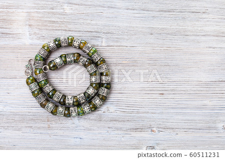top view of vintage jadeite necklace on gray top view of vintage jadeite necklace on gray 60511231