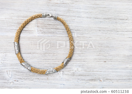 top view of rope with coins necklace on gray top view of rope with coins necklace on gray 60511238