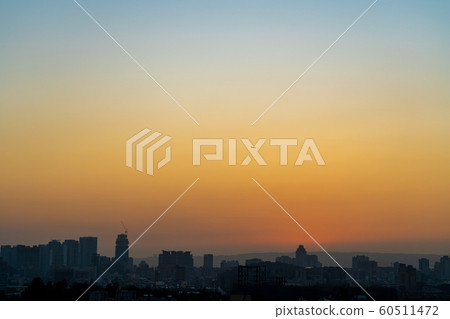 Modern city skyline sunset time colorful sky background Modern city skyline sunset time colorful sky background 60511472