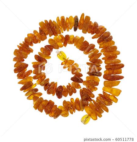 spiral necklace from rough amber nuggets isolated spiral necklace from rough amber nuggets isolated 60511778