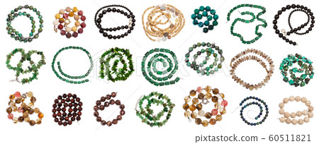 set of various coiled strings of beads isolated 60511821