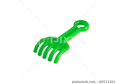 Image of children's small toy rake isolated on white background Image of children's small toy rake isolated on white background 60513301