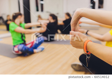 fitness, sport, training, gym and lifestyle concept - group of women working out in gym. fitness, sport, training, gym and lifestyle concept - group of women working out in gym. 60514012