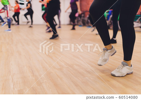 fitness, sport, training, gym and lifestyle concept - group of women working out in gym. fitness, sport, training, gym and lifestyle concept - group of women working out in gym. 60514080