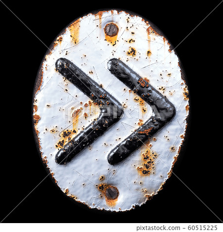 Symbol right pointing double angle quotation mark made of forged metal on the background fragment of a metal surface with cracked rust. 60515225
