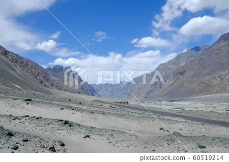 A road from India's northernmost Ladakh to the Pakistan border, riding a bike through the Cardonra Pass and Nubra Valley 60519214