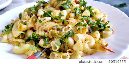 Elbow macaroni pasta with tomatoes, beans and Elbow macaroni pasta with tomatoes, beans and 60519355