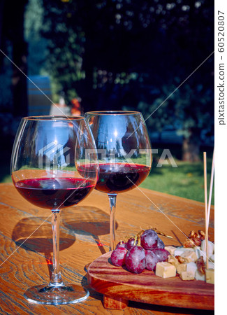 Glasses Of Fine Red Wine With Grape and Cheese Glasses Of Fine Red Wine With Grape and Cheese 60520807
