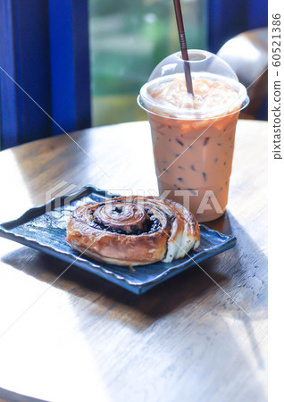 iced coffee, iced latte and danish 60521386