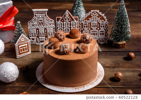 Christmas holiday table with delicious truffle cake Christmas holiday table with delicious truffle cake 60522128