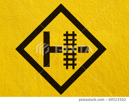 warning train sign painted on a stucco wall 60523502