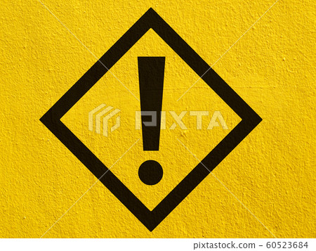 a black warning attention sign points painted on a 60523684