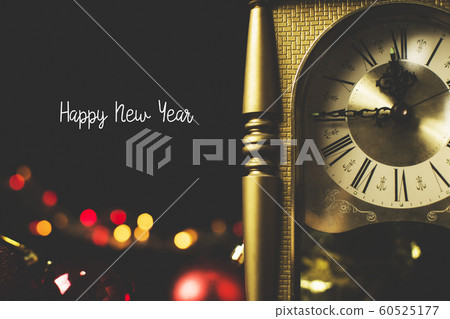 Retro style clock counting last moment before to Happy New Year at midnight time. Retro style clock counting last moment before to Happy New Year at midnight time. 60525177