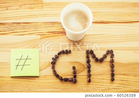 Good Morning. Coffee Time. Coffee to go and beans on a wooden background 60526389