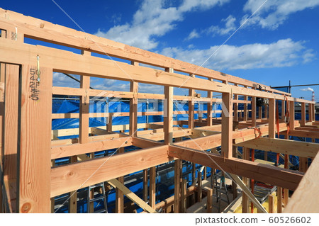 Upper building of a new house on a sunny day Upper building of a new house on a sunny day 60526602
