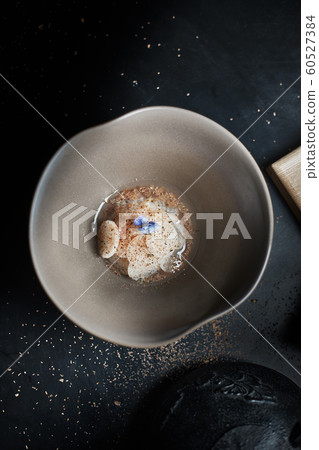 Daikon Soup with katsuobushi on dark background.. 60527384