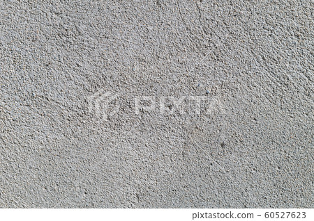 Gray textured cement wall background with fine concrete chips. Construction backgrounds Gray textured cement wall background with fine concrete chips. Construction backgrounds 60527623