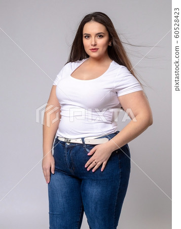 Plus Size Model with long hair posing in studio - Stock Photo [60528423] -  PIXTA