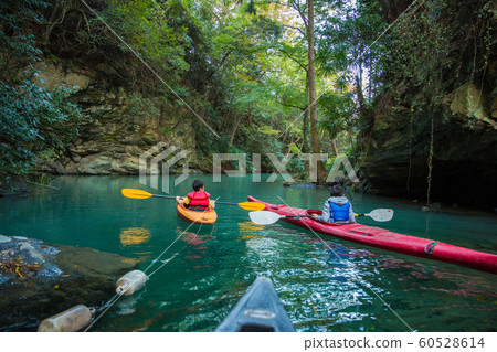 Children enjoying a canoe 60528614