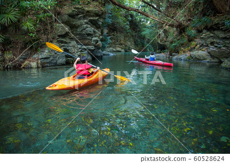 Children enjoying a canoe 60528624