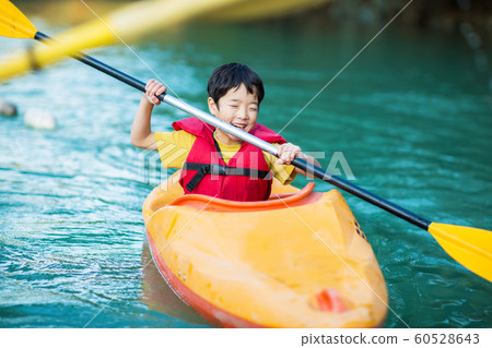 Children enjoying a canoe 60528643