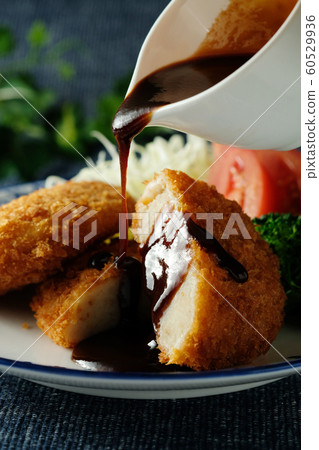 Beef croquette with sauce Beef croquette with sauce 60529936