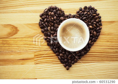 Good Morning. Paper Coffee Cup With Coffee Bean on The Wooden Table 60531290