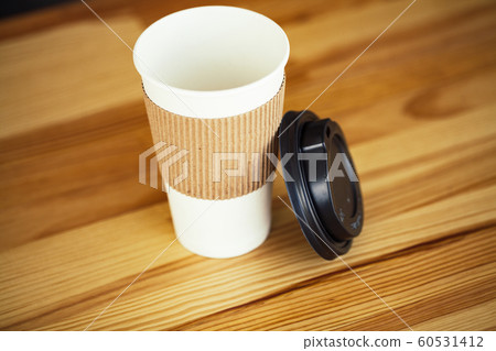 Good Morning. Coffee Time. Coffee to go and beans on a wooden background 60531412