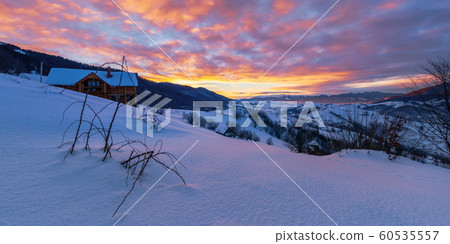 mountainous countryside in winter at dawn 60535557