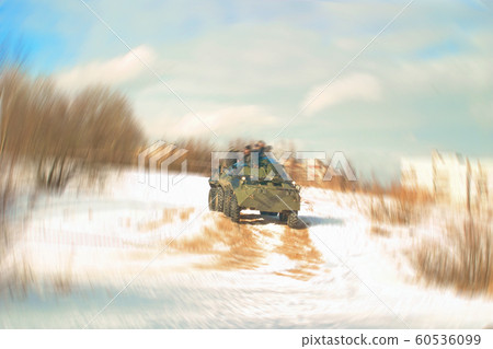 Blurred image of spectators riding on an armored personnel carrier during the festival of reenactors. Blurred image of spectators riding on an armored personnel carrier during the festival of reenactors. 60536099