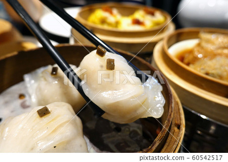 Chinese dim sum, Black truffle har gao (shrimp dumplings) Chinese dim sum, Black truffle har gao (shrimp dumplings) 60542517
