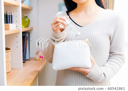 Spray pouch take out put woman Spray pouch take out put woman 60542861