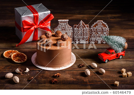 Christmas holiday table with delicious truffle cake  60546479