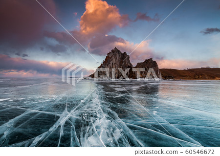 Colorful sunset over the crystal ice of Baikal lake Colorful sunset over the crystal ice of Baikal lake 60546672